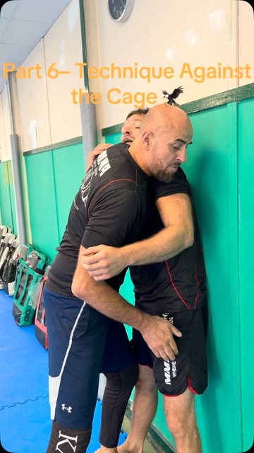 MMA Kabashi coach demonstrating a ground control technique