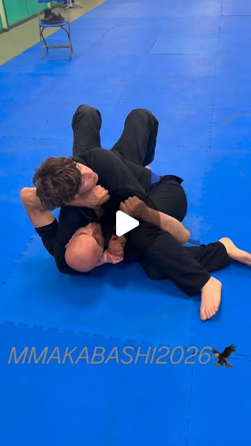 Two MMA Kabashi students practising a ground-control submission