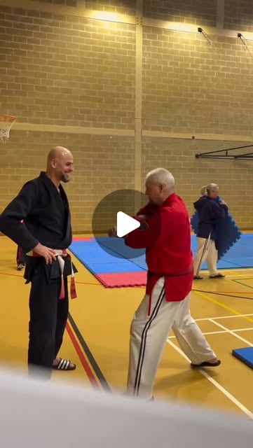 Ibush Kabashi training with Japanese Jujitsu practitioner Bernard in a sports hall