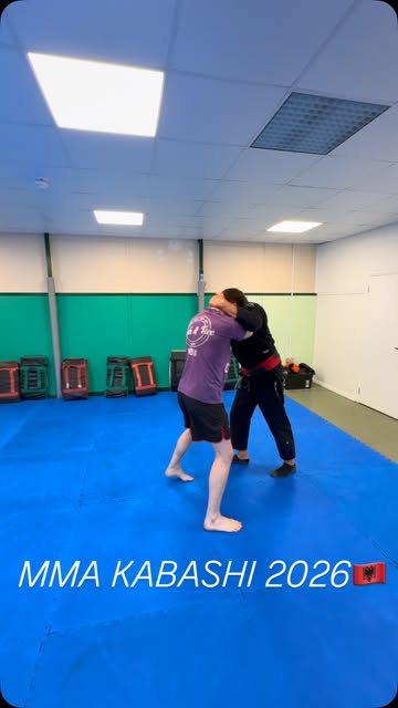 Two MMA Kabashi students sparring on the training mats